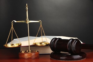 Justice scale and wood gavel