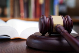 Wooden gavel and books