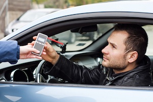 Guy Taking Breathalyzer