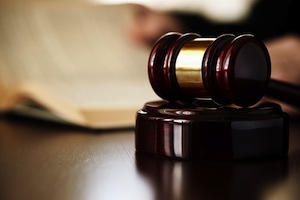 Wooden gavel and book