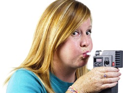 a woman blowing into a police breath testing machine